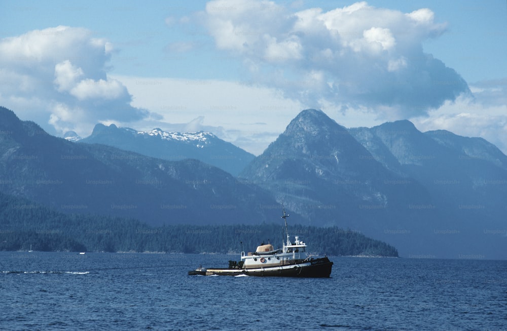 a boat floating on top of a large body of water