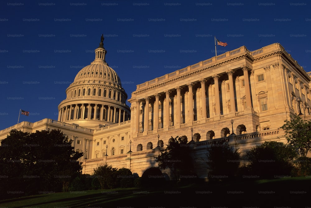 a large building with a flag on top of it