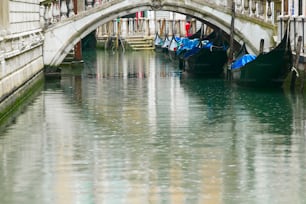 a couple of boats that are sitting in the water