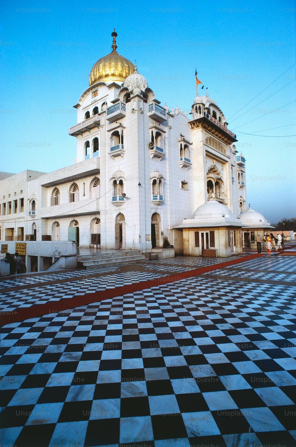 a large white building with a golden dome