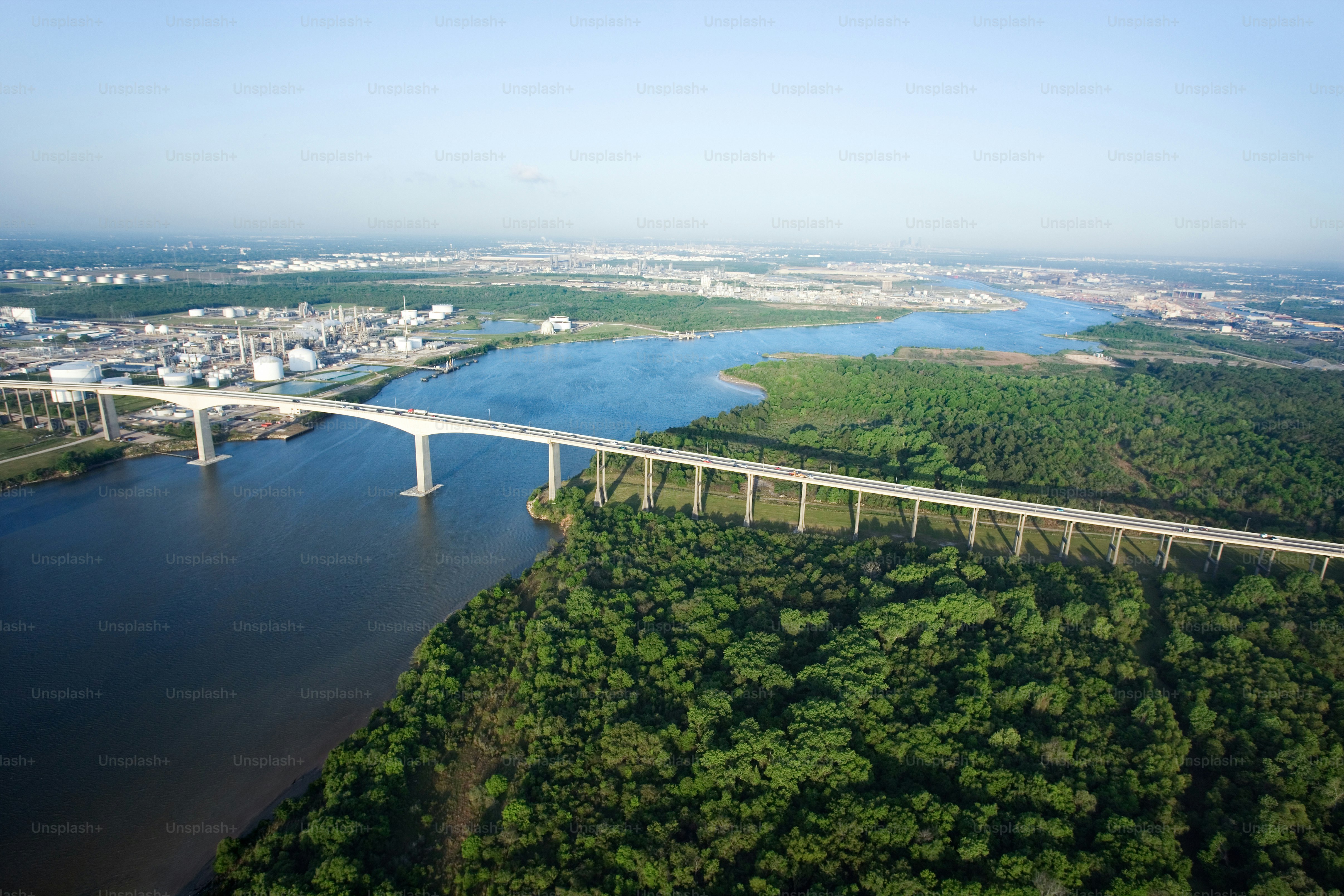 an aerial view of a bridge over a river