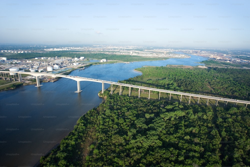 an aerial view of a bridge over a river