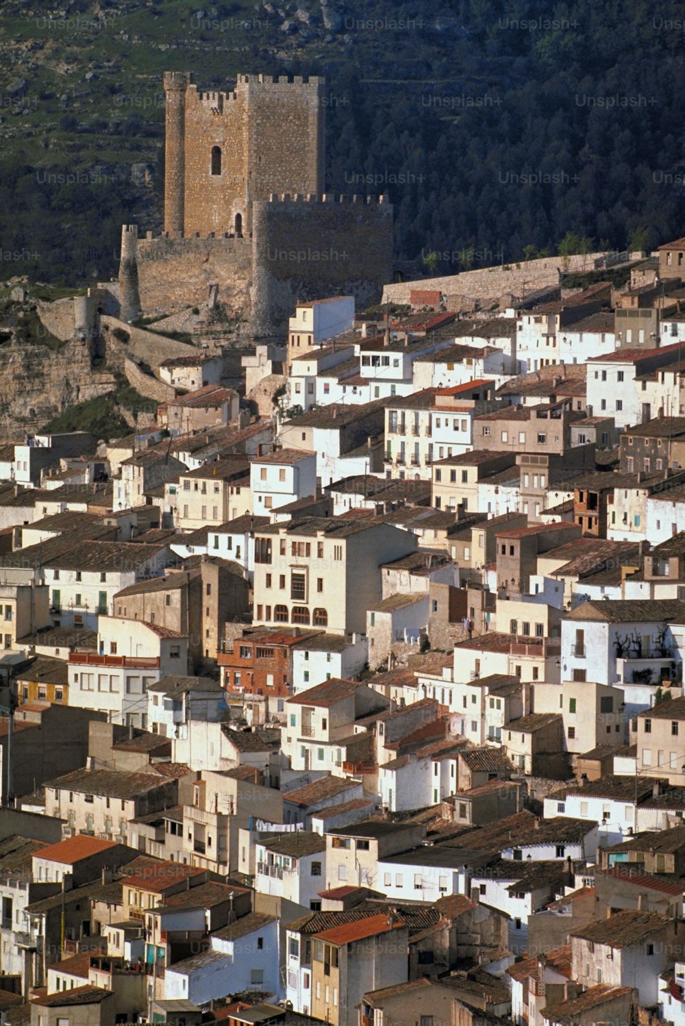 a view of a city with lots of white buildings