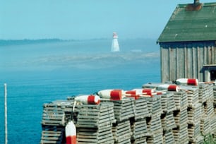 a group of wooden crates sitting on top of a beach