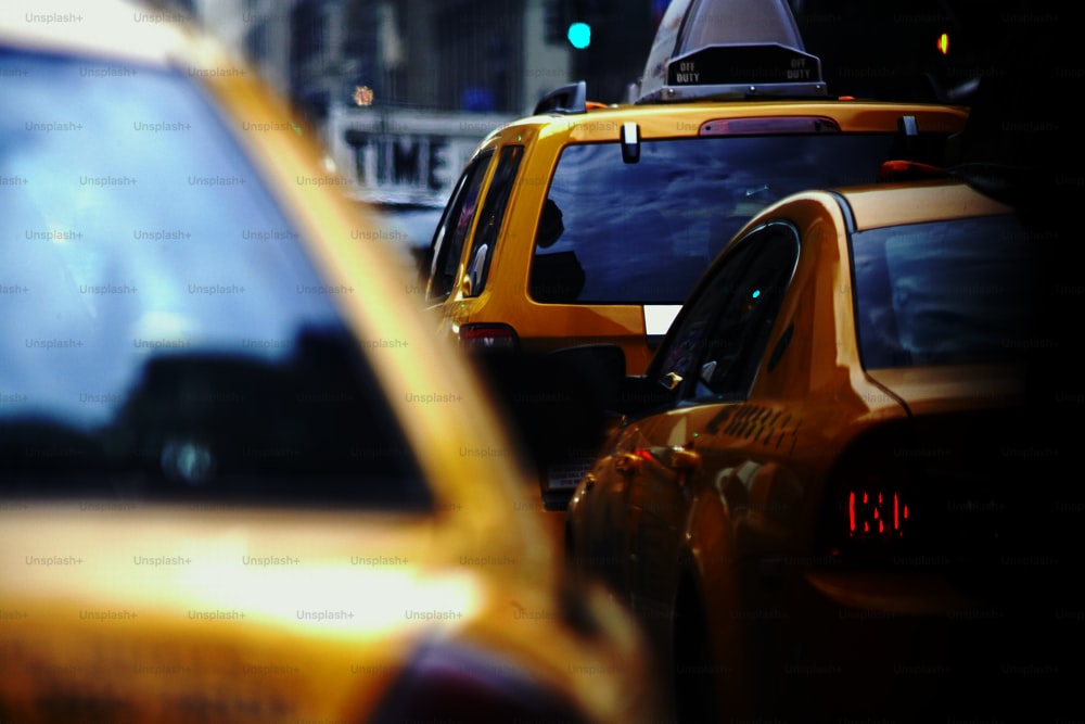 a close up of a taxi cab and a taxi cab