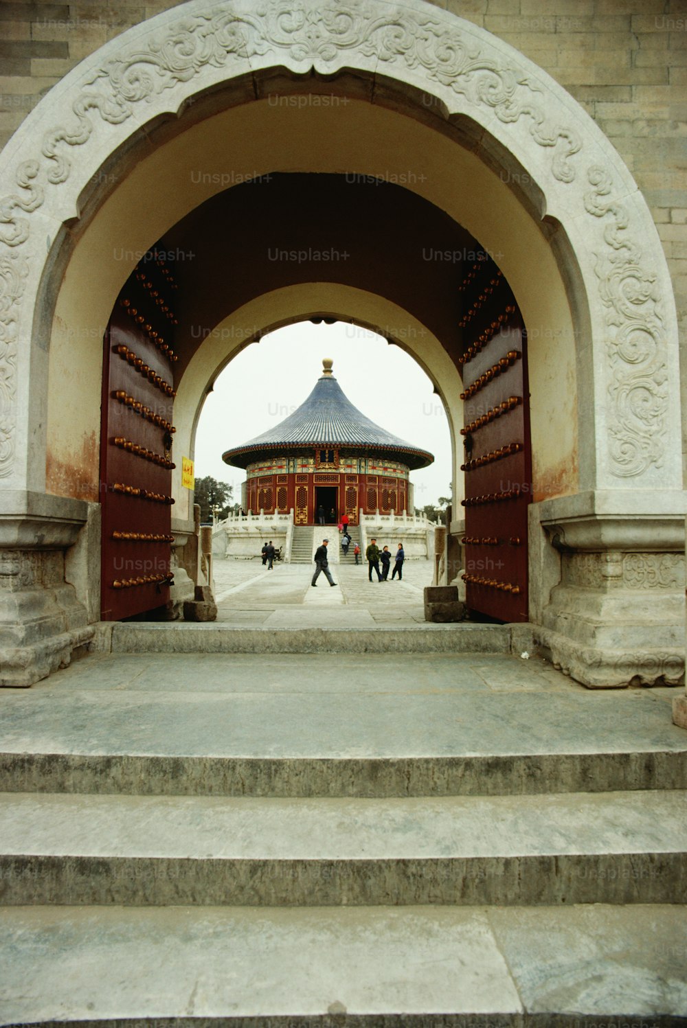 a group of people walking up and down some steps