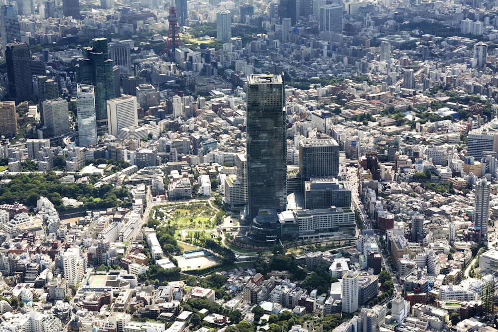 an aerial view of a city with tall buildings