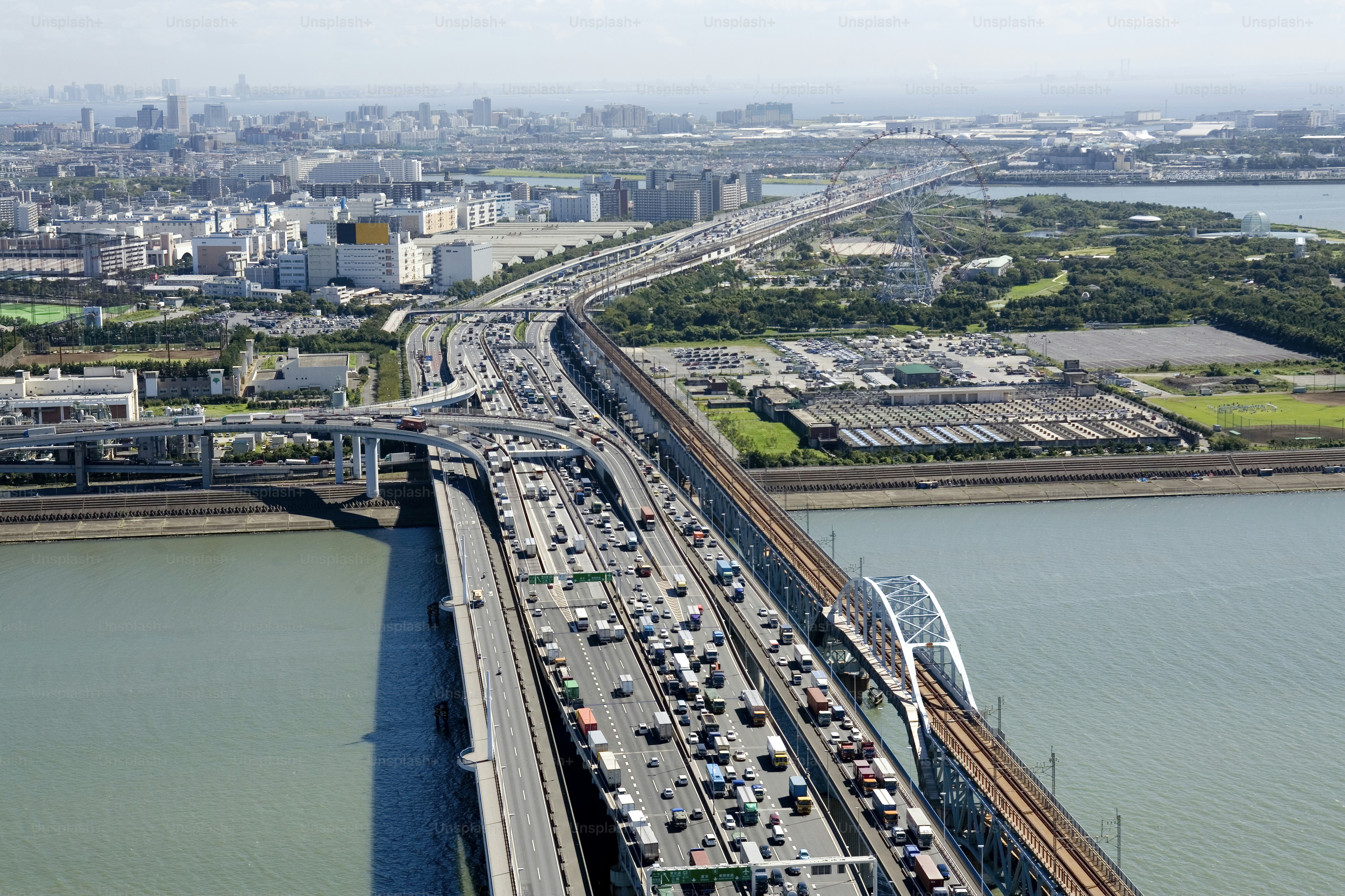 an aerial view of a busy highway in a city