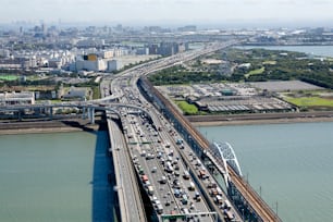 an aerial view of a busy highway in a city