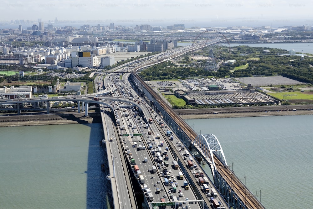 an aerial view of a busy highway in a city