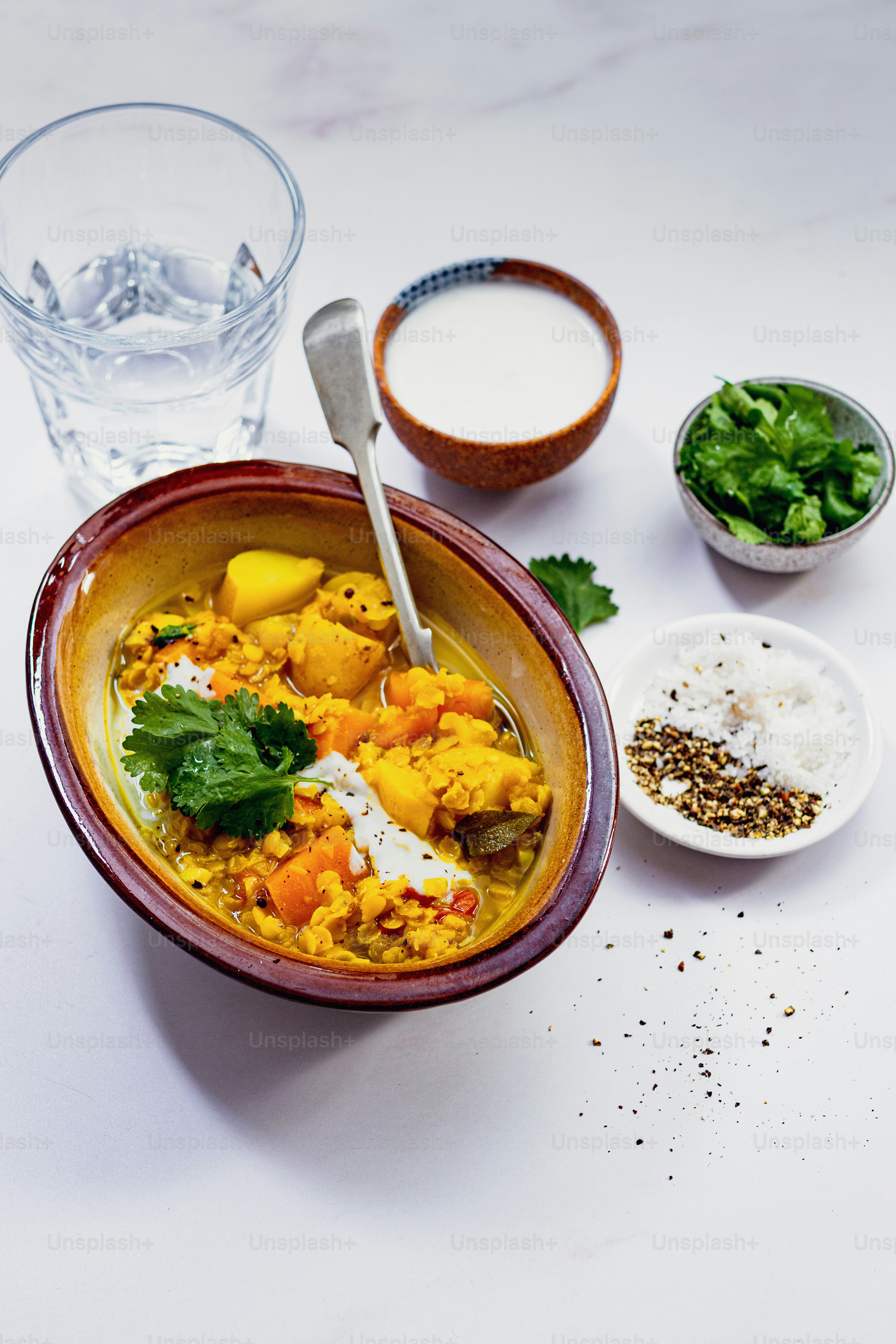 a bowl of food with a spoon in it