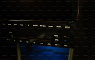 a close up of a microwave in a dark room