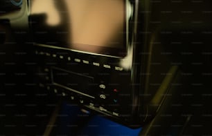 a close up of a television in a car