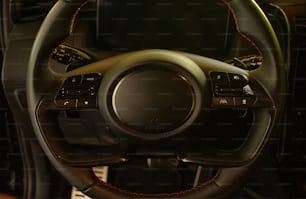 a close up of a steering wheel in a vehicle