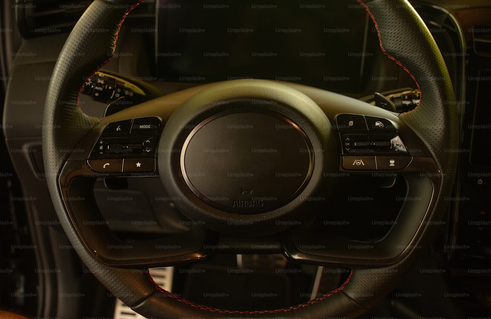 a close up of a steering wheel in a vehicle