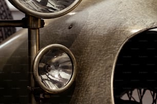 a close up of a clock on a metal object