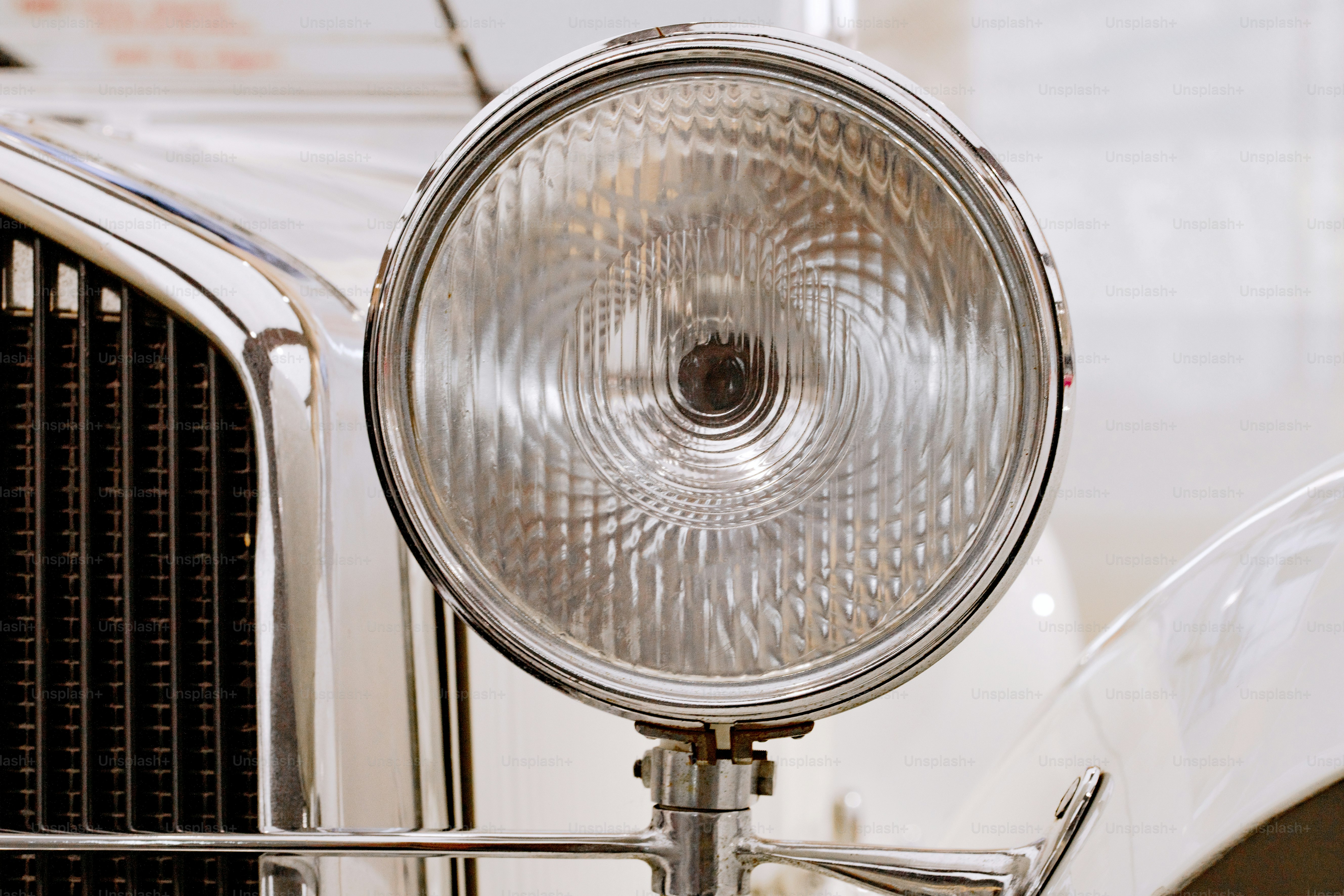 a close up of a headlight on a car