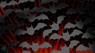 Un grupo de murciélagos rojos y negros sobre fondo negro