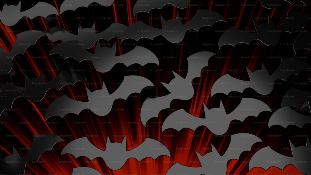 Un grupo de murciélagos rojos y negros sobre fondo negro