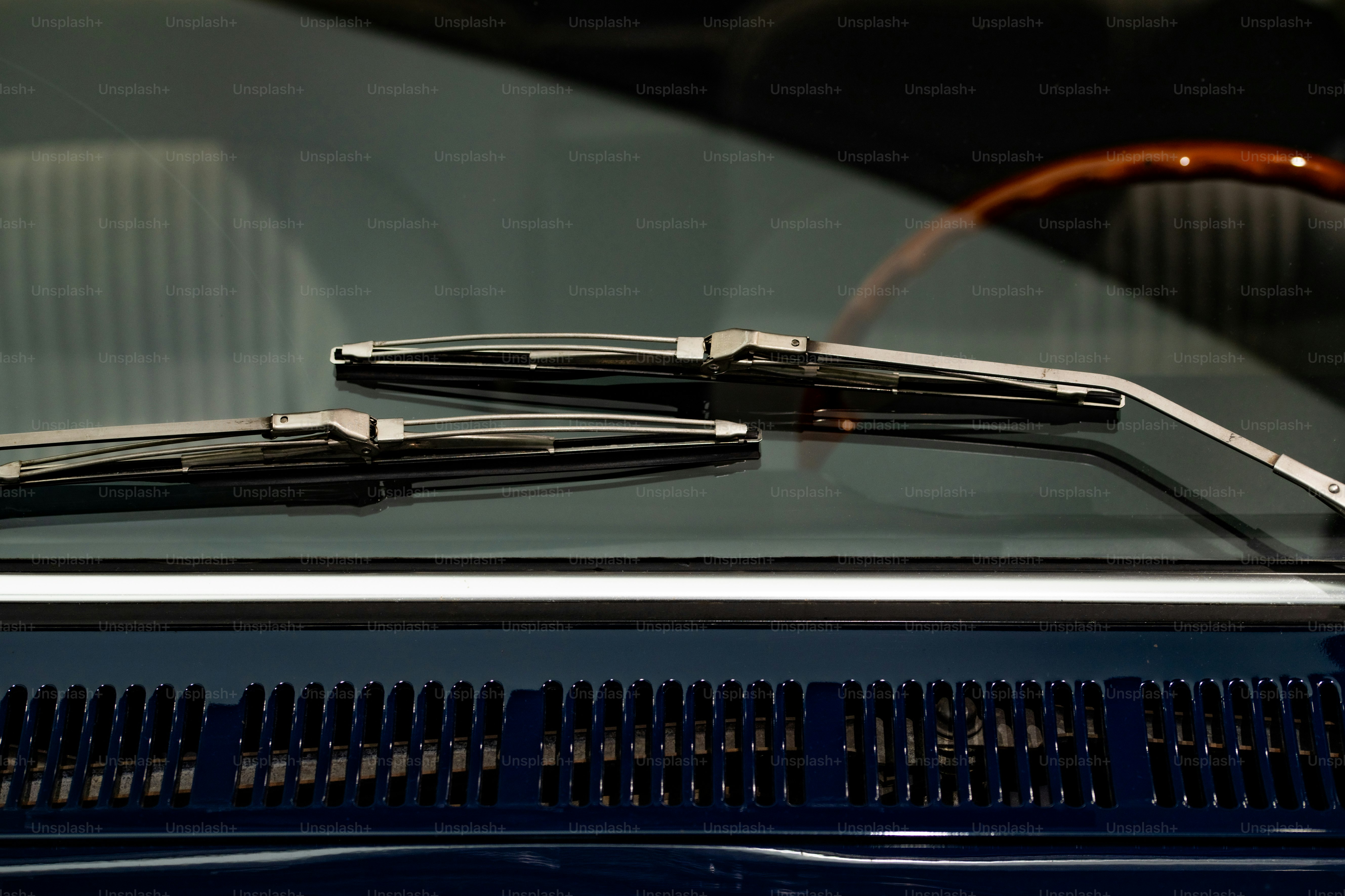 a pair of scissors sitting on top of a car