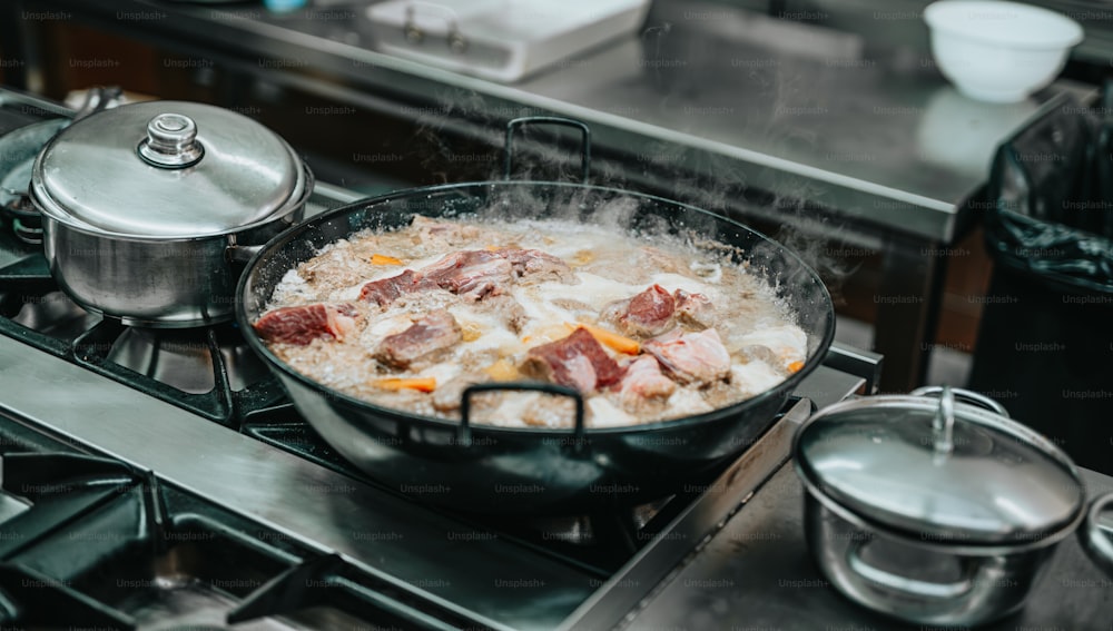 a pot of food is cooking on the stove