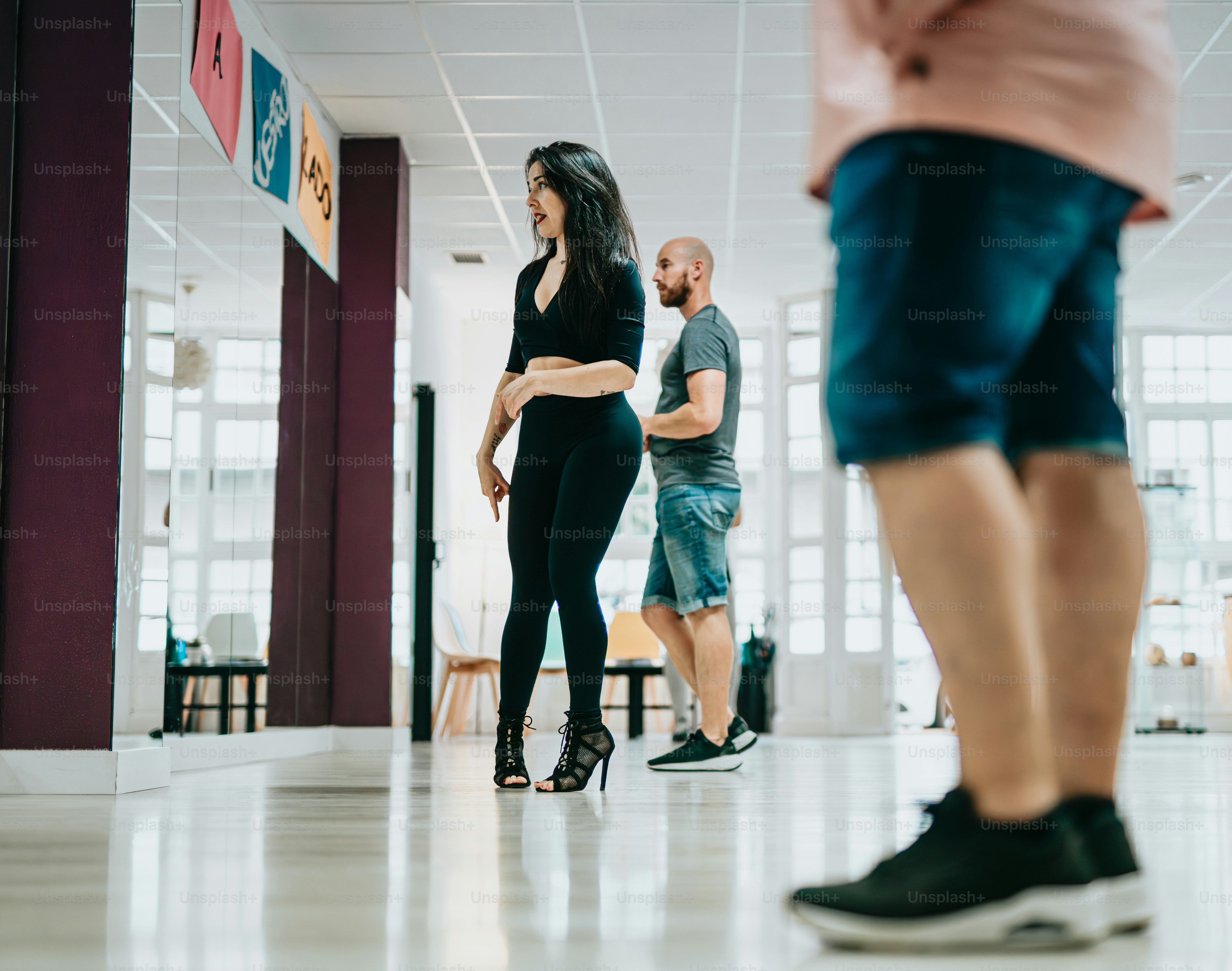 a group of people standing in a room