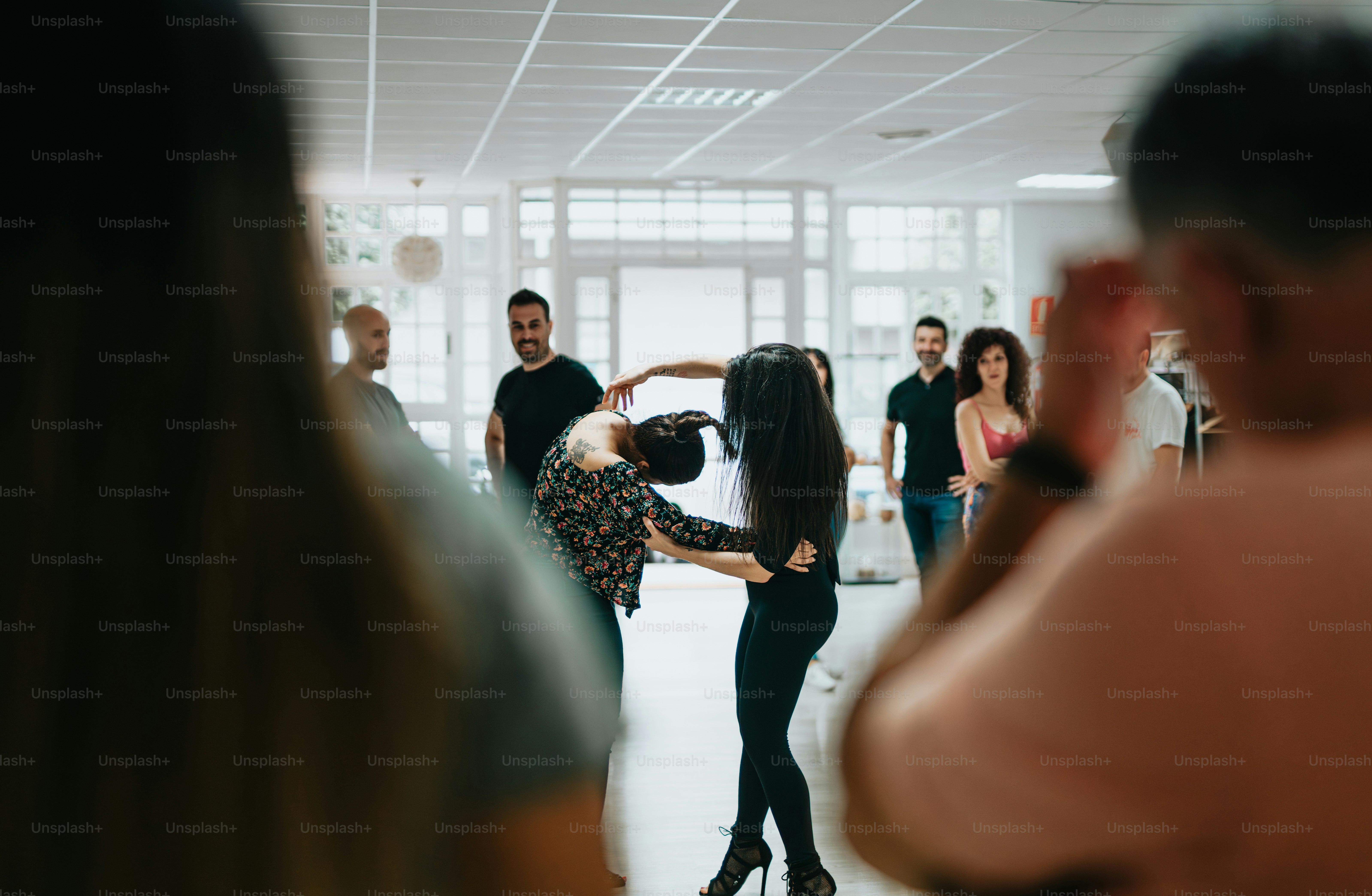 a group of people standing in a room