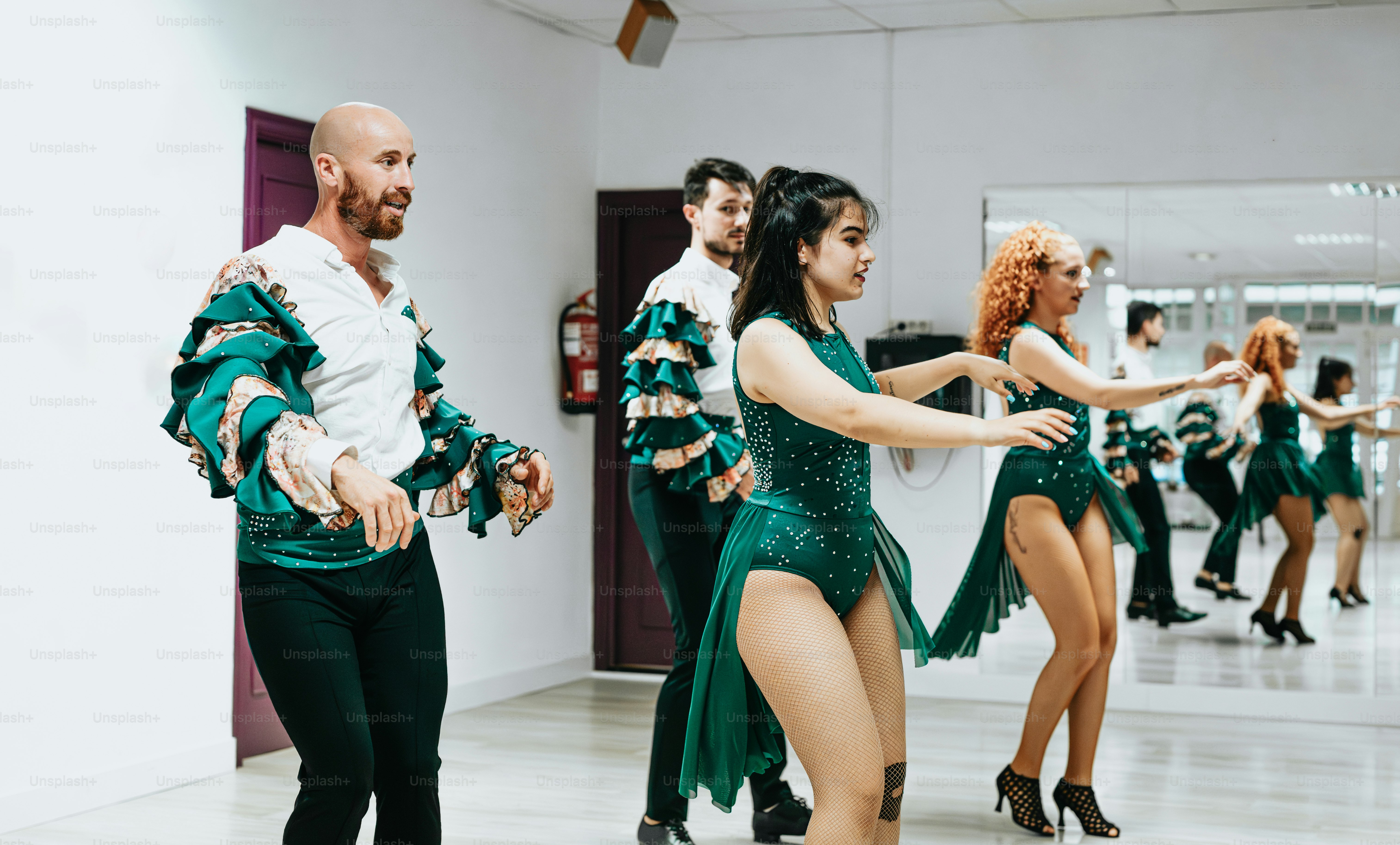 A group of dancers in a dance studio photo – Rehearsal Image on Unsplash