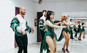 a group of dancers in a dance studio