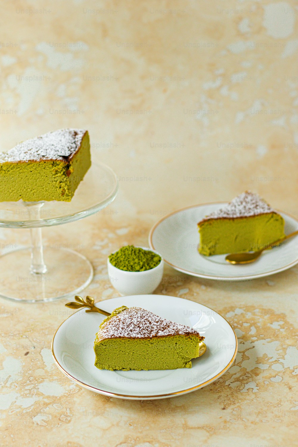 a slice of green cake on a plate