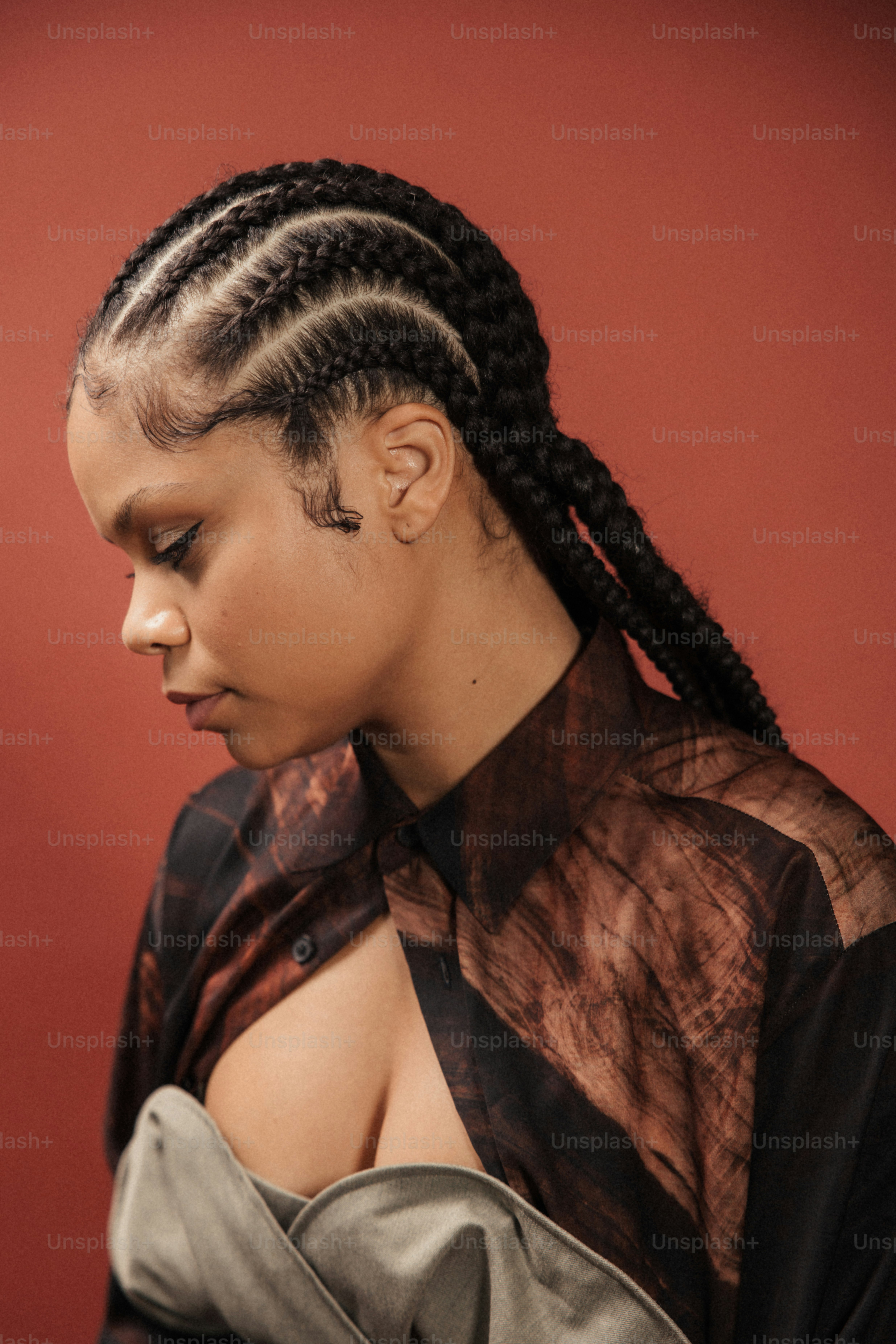 a woman with braids in her hair