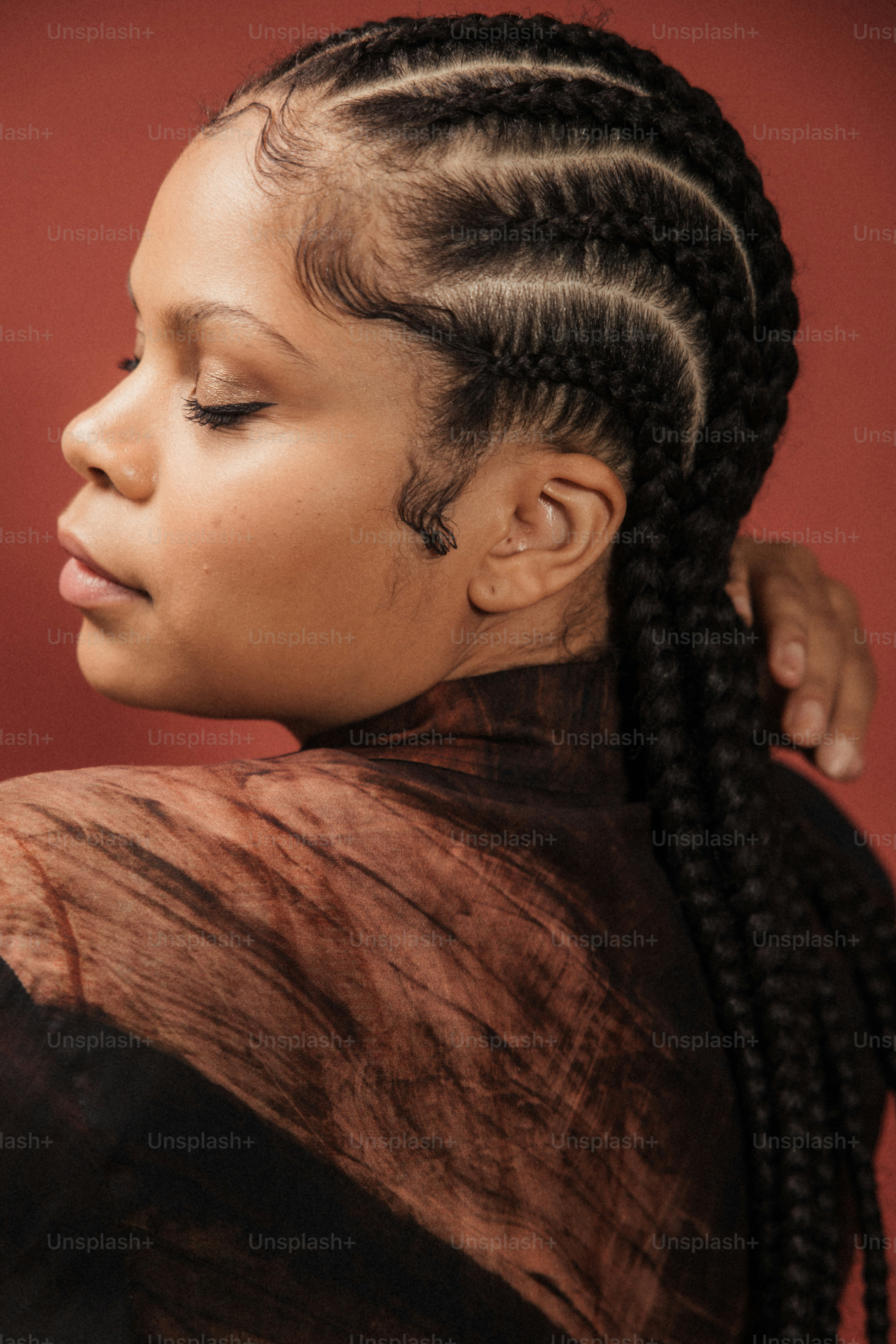 A woman with braids in her hair photo – Afrohair Image on Unsplash