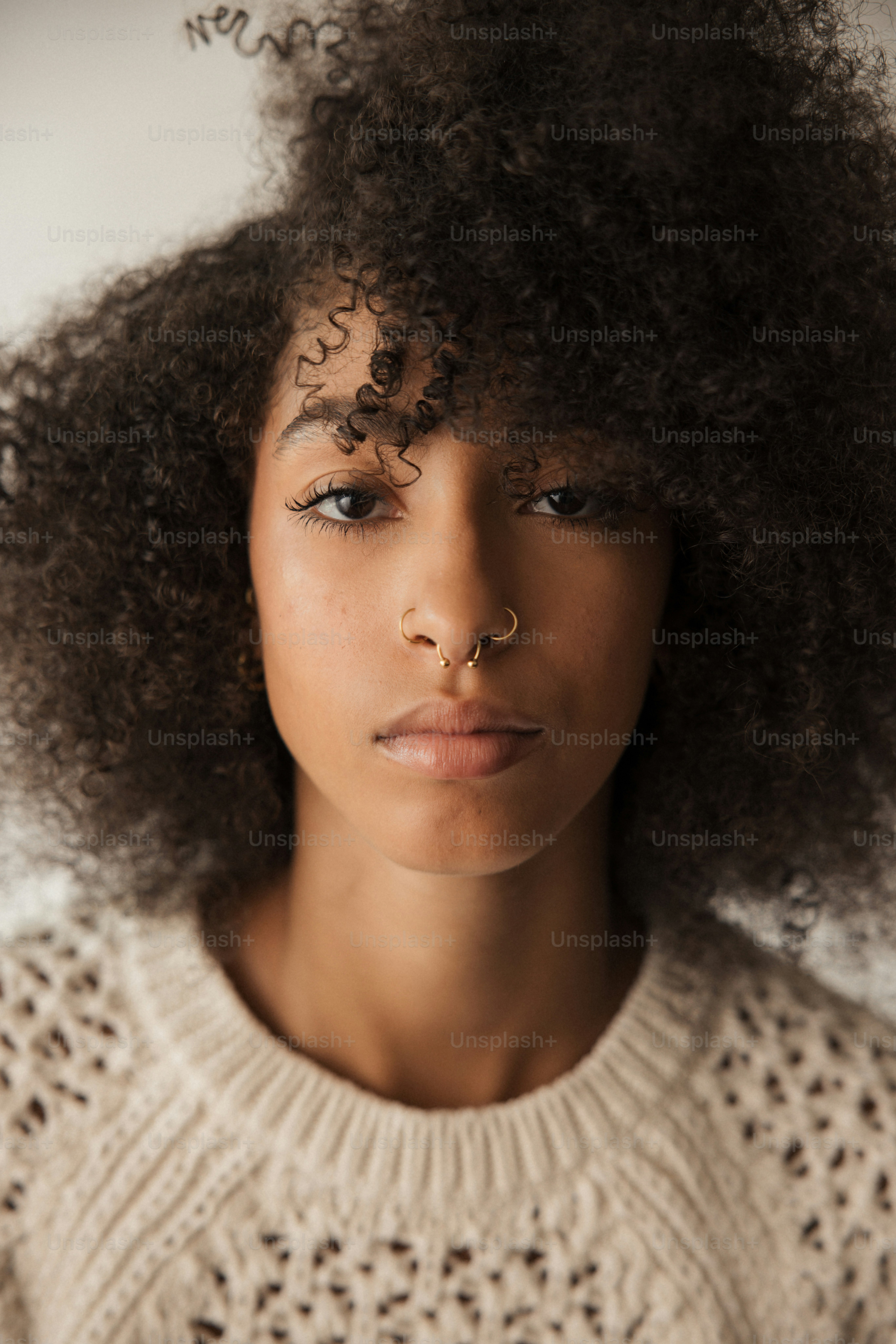 a close up of a person with an afro