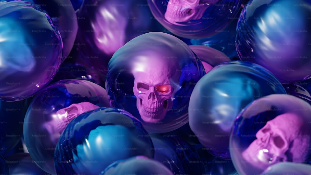 a bunch of purple and blue balls with a skull on them