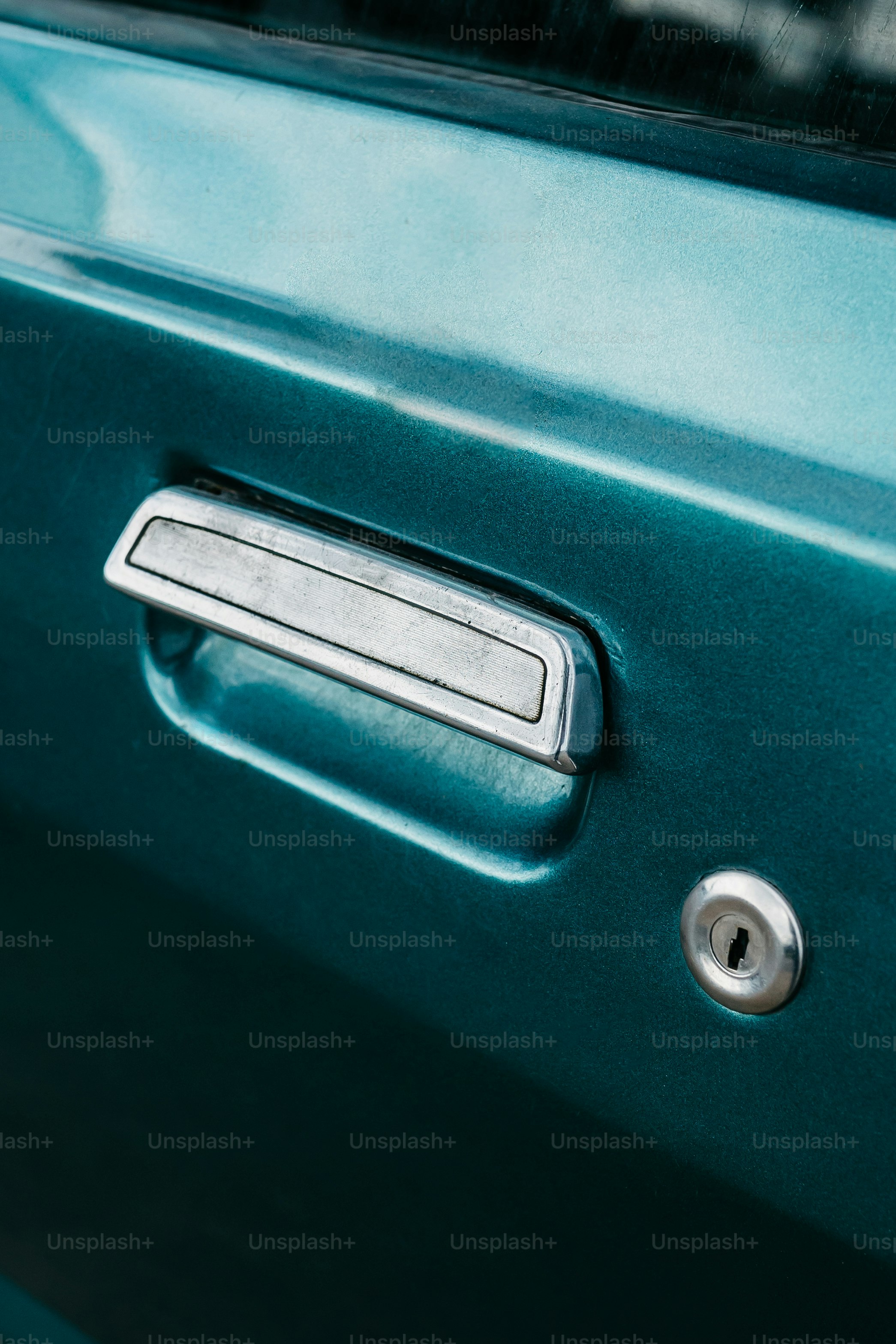 a close up of a door handle on a car