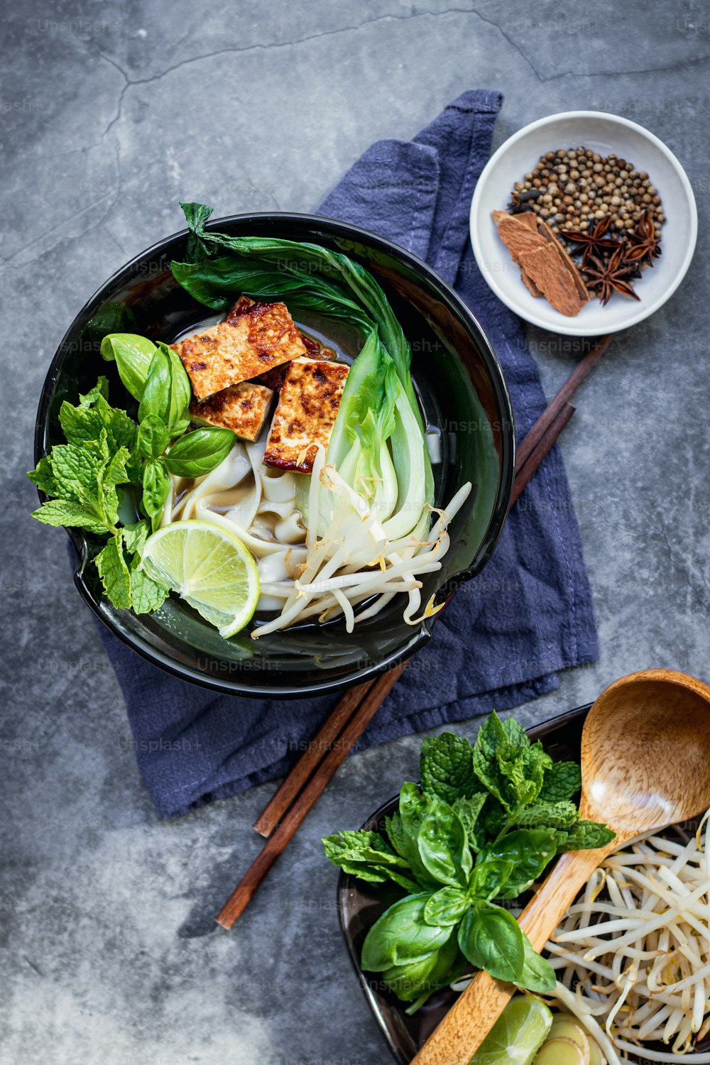 a couple of bowls of food on a table