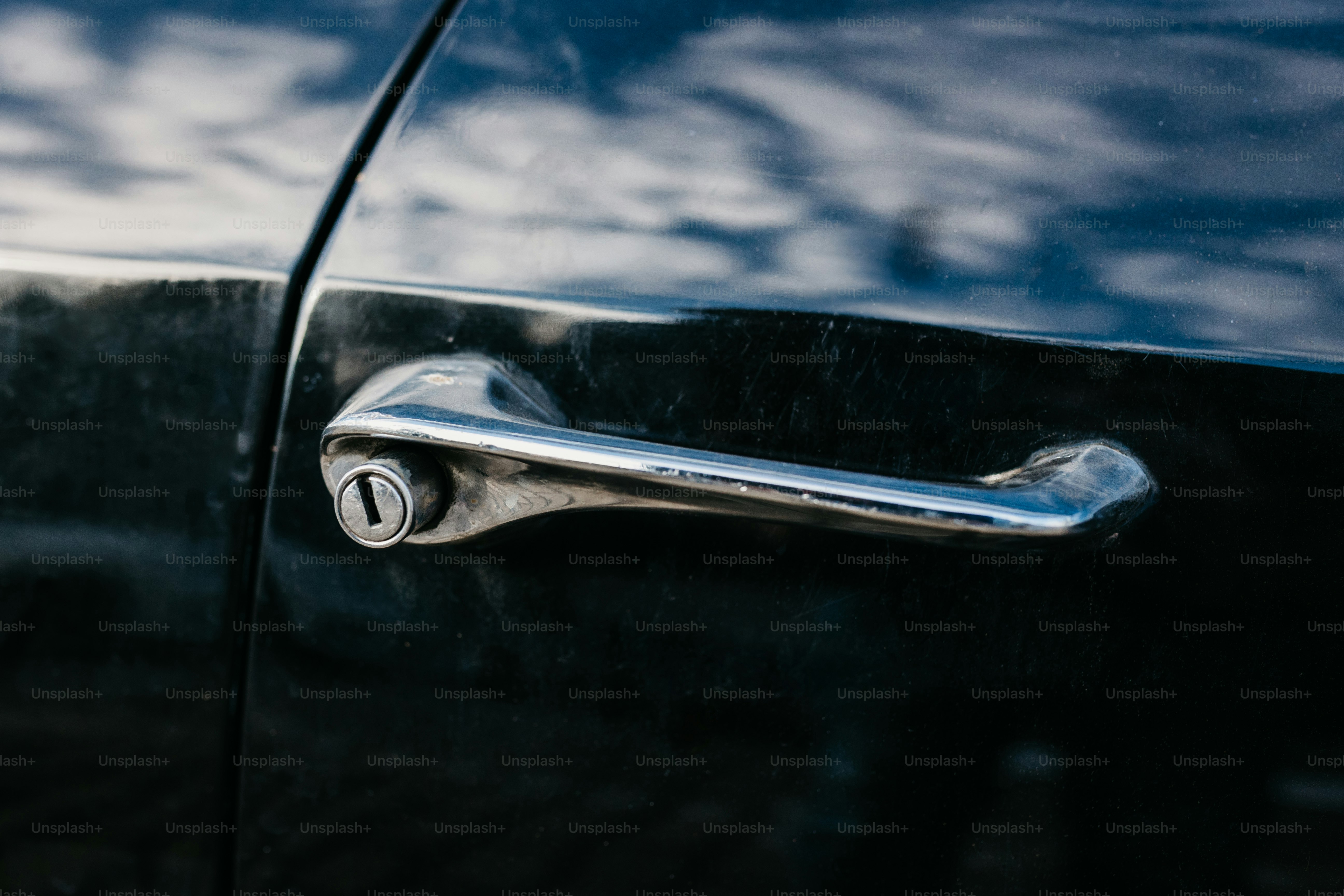 a close up of a door handle on a car