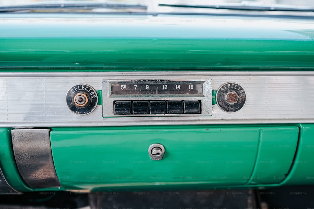a close up of the front of a green car