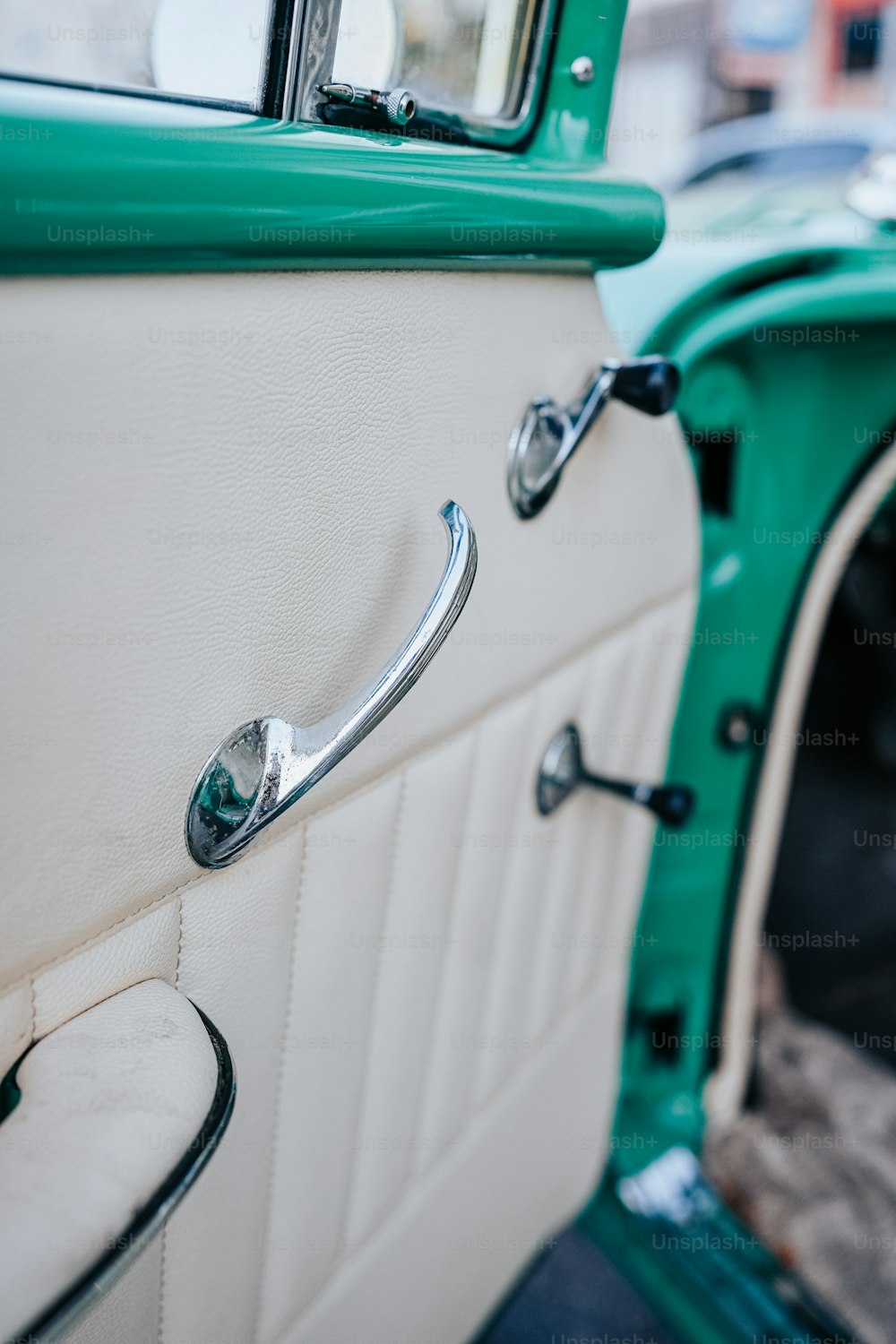 a close up of a door handle on a car