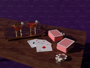 a wooden table topped with playing cards and a tray of drinks