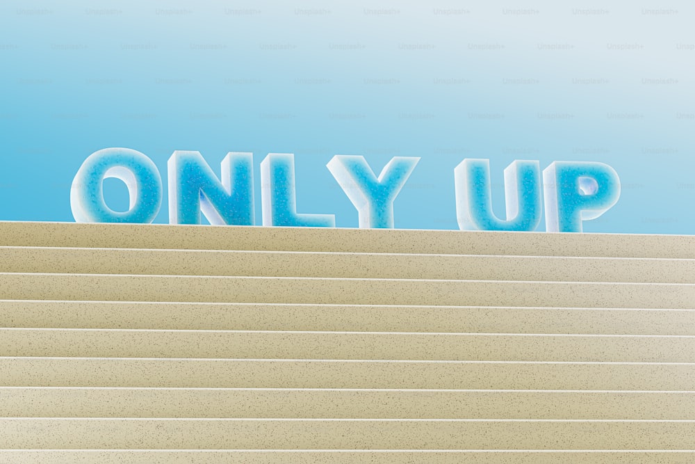 the word only up written in blue letters