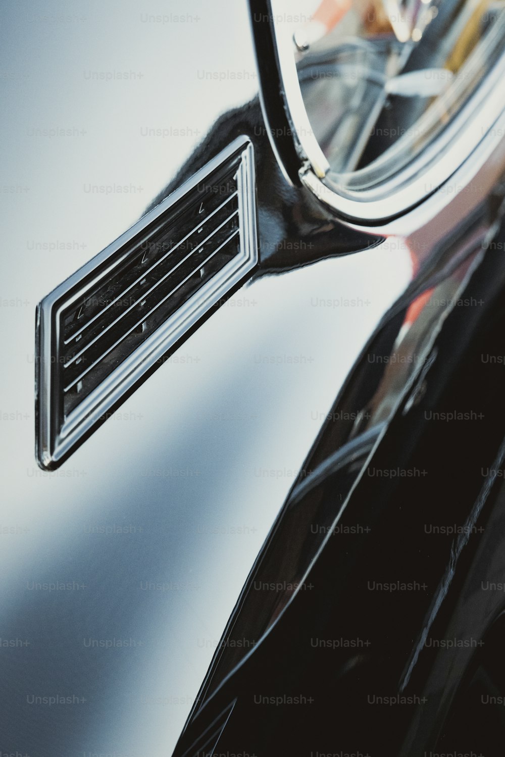 a close up of a mirror on a car