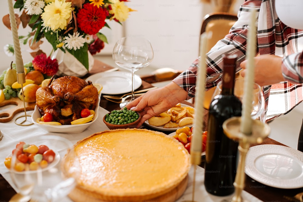 a table filled with food and wine glasses