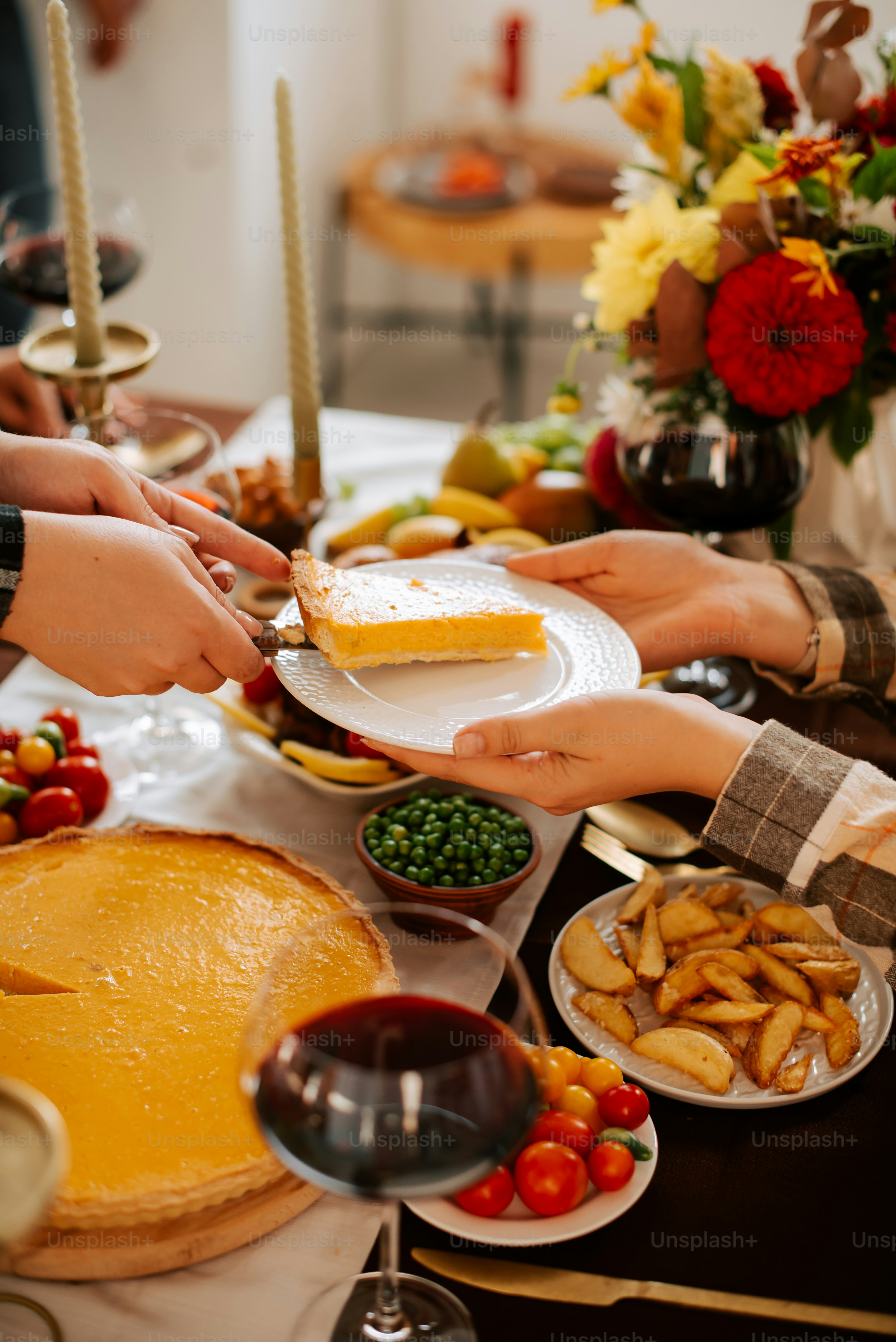 a group of people serving food to each other
