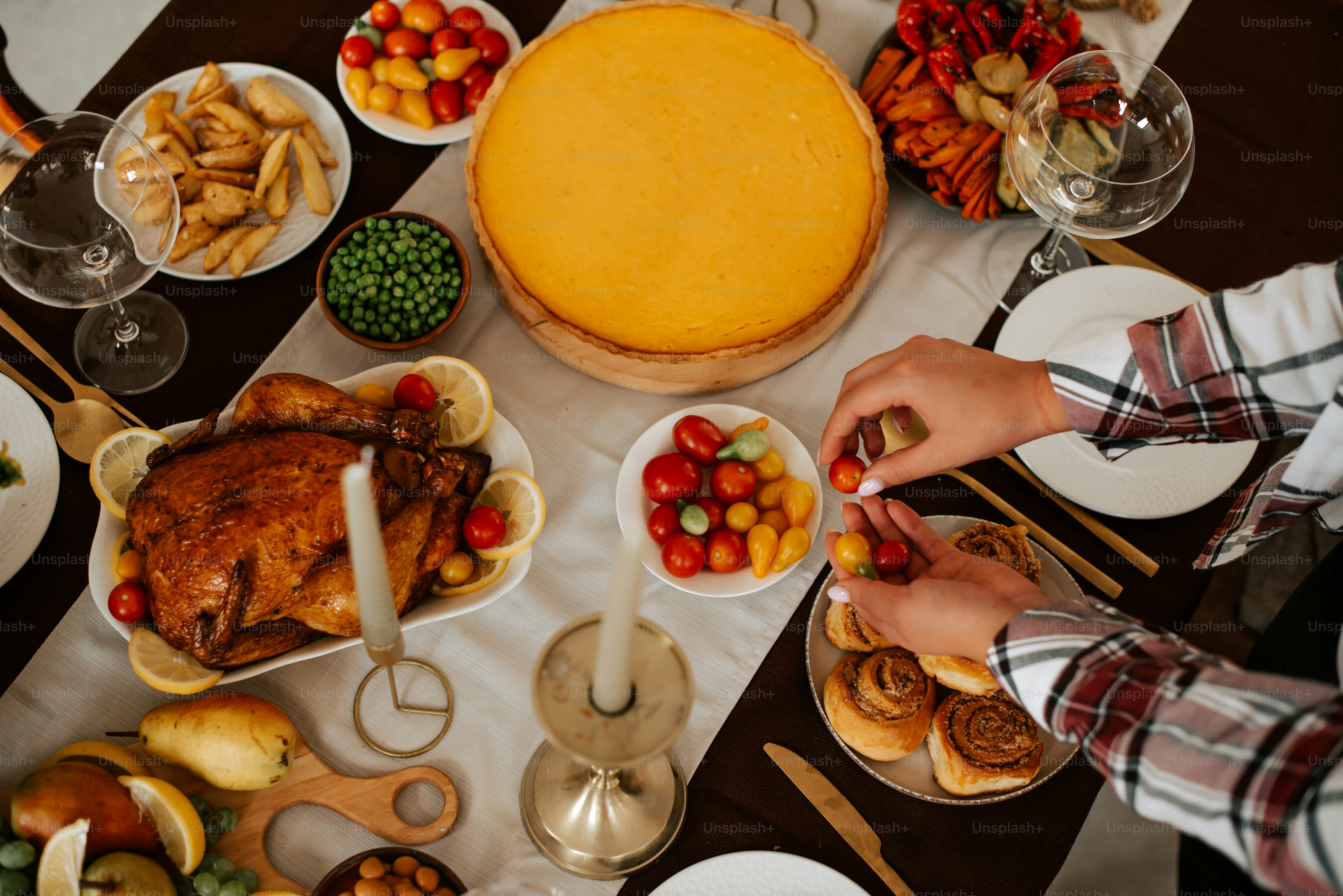 a table full of food with a turkey on it