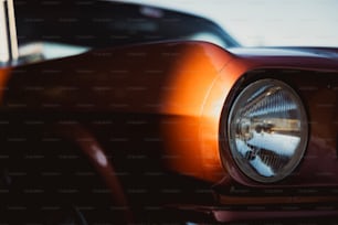 a close up of a headlight on a car