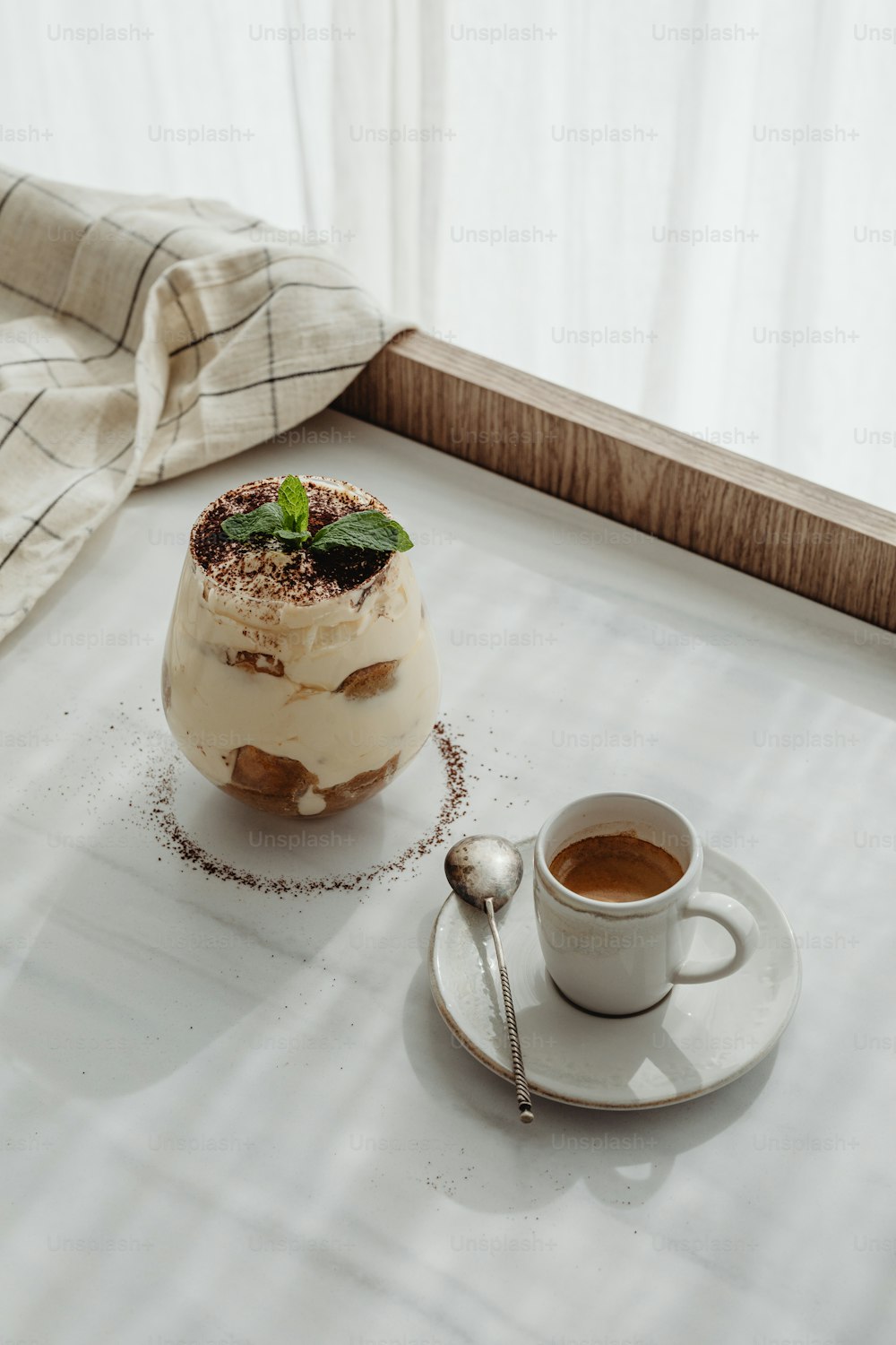 a dessert and a cup of coffee on a table