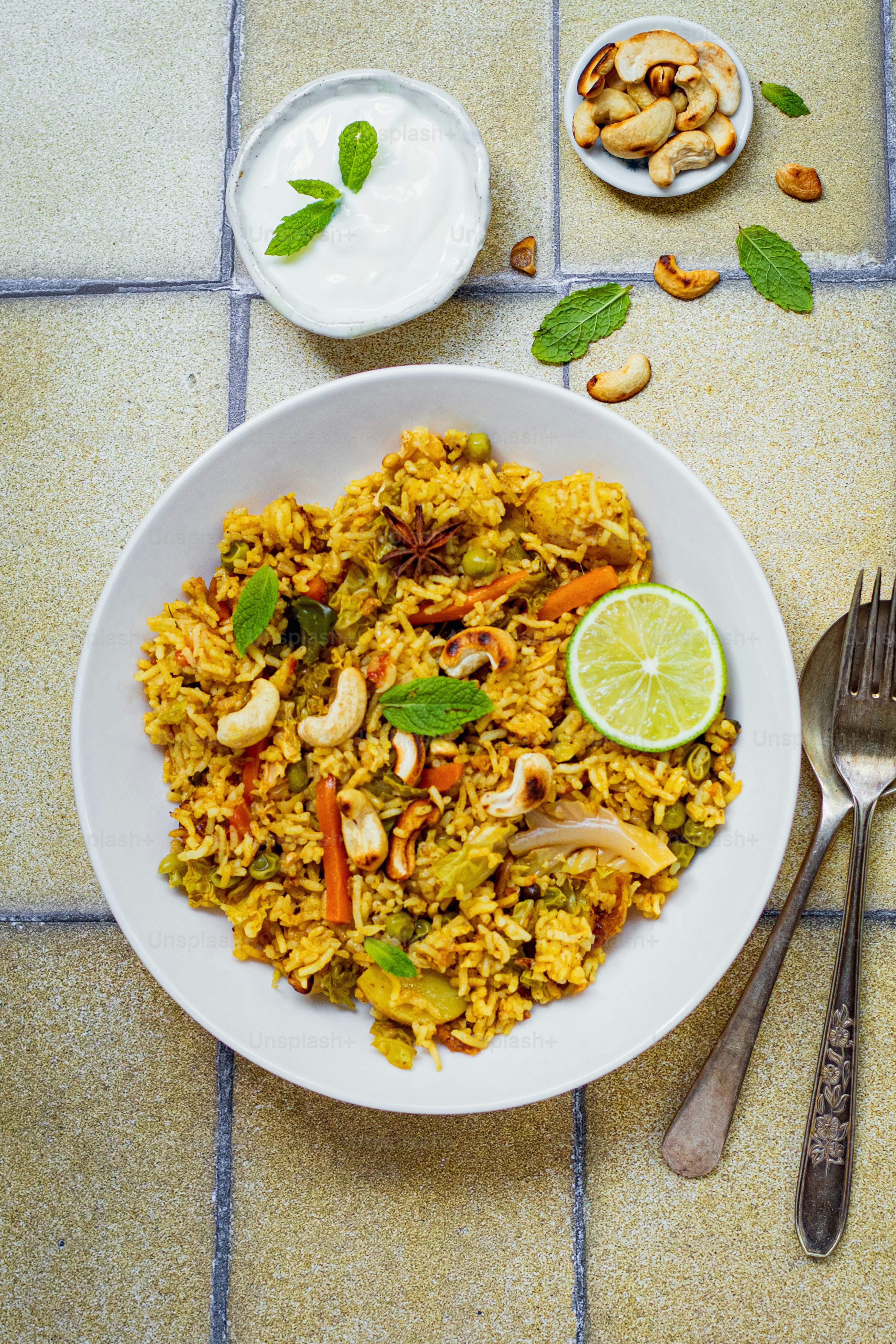 a plate of food with a fork and a spoon