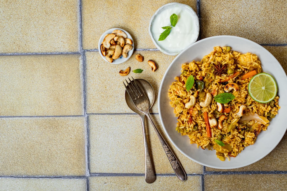 a plate of food on a tiled floor