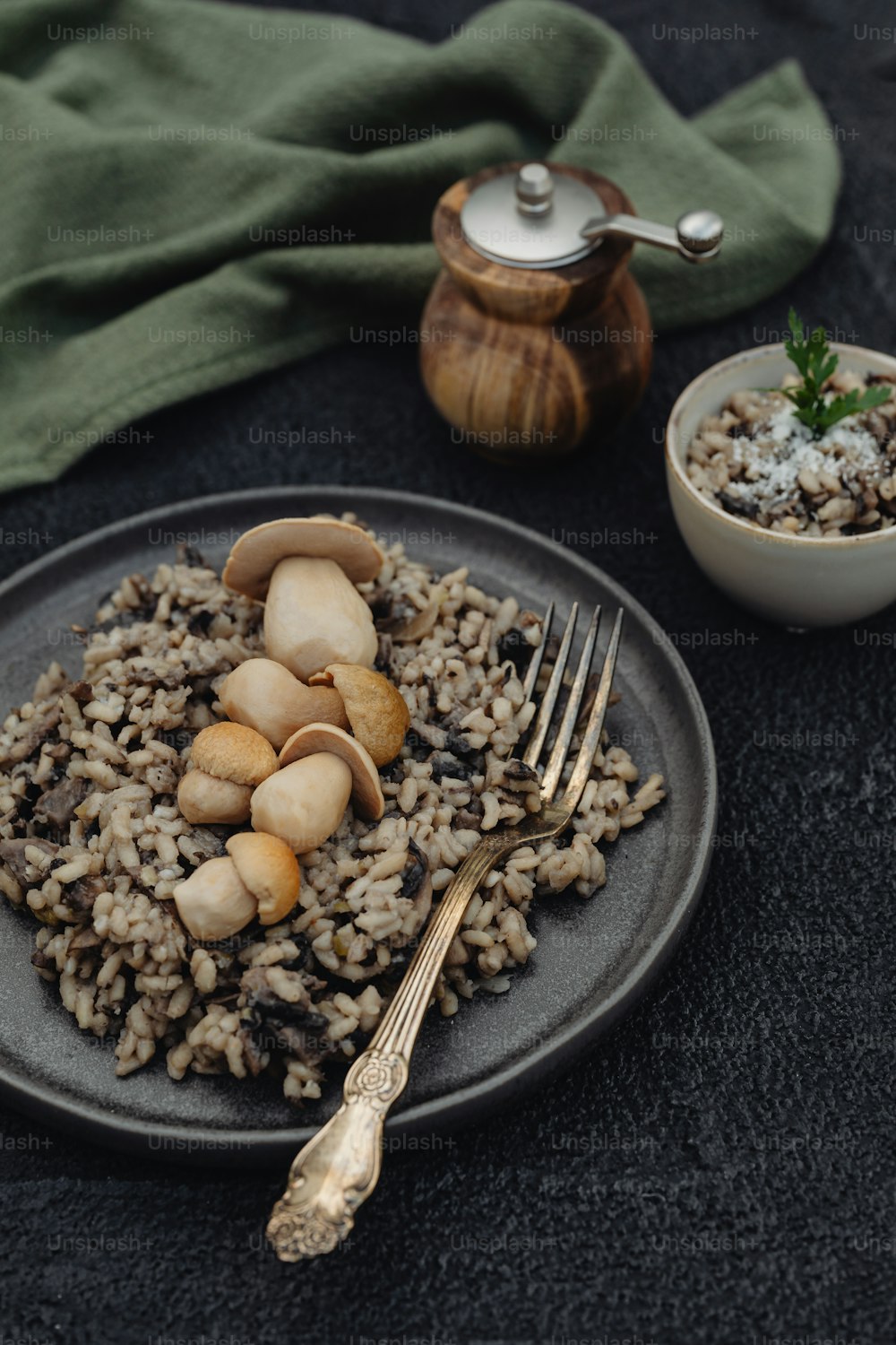 a plate of food with mushrooms and rice